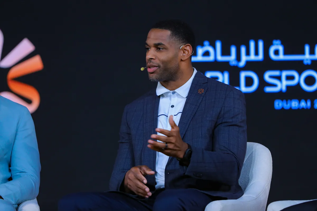 Marques Colston speaking on stage at the World Sports Summit in Dubai