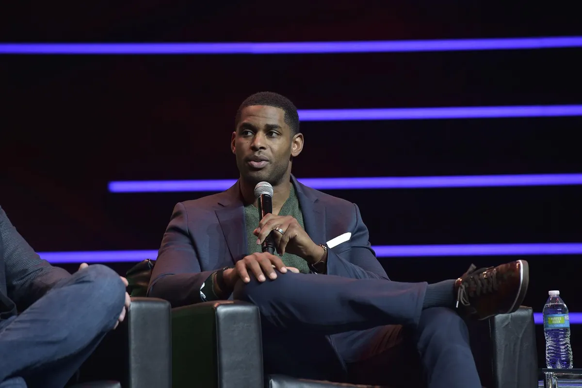 Marques Colston on a darkened keynote stage